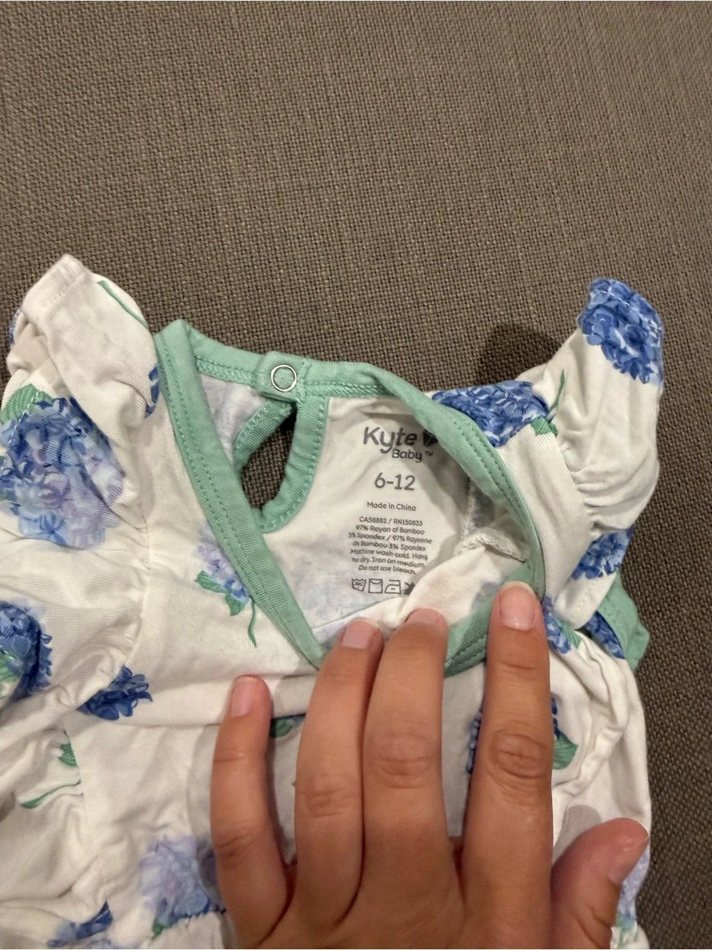Kyte BABY White Romper with Blue Hydrangea and Mint Trim